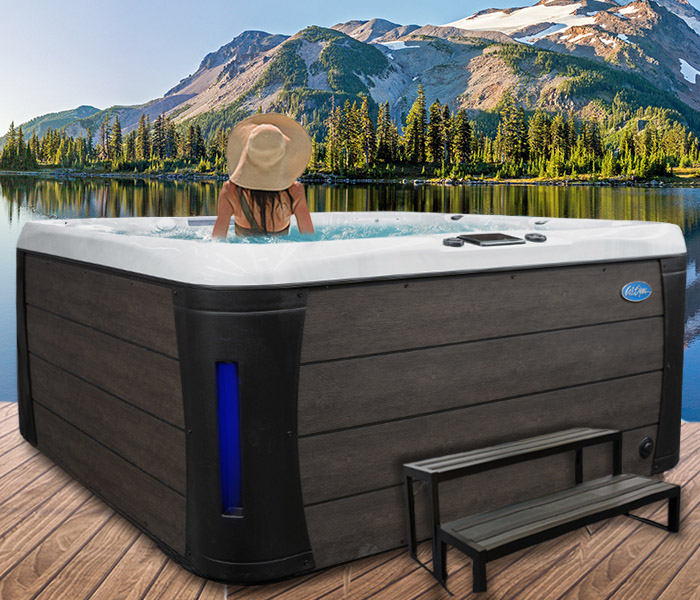 Calspas hot tub being used in a family setting - hot tubs spas for sale Candé